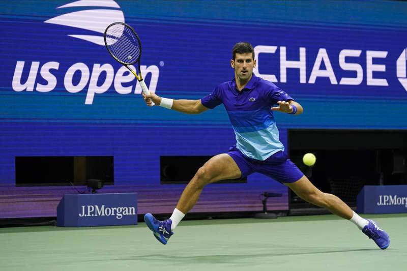 The Latest: Djokovic wins, takes Grand Slam chance to final
