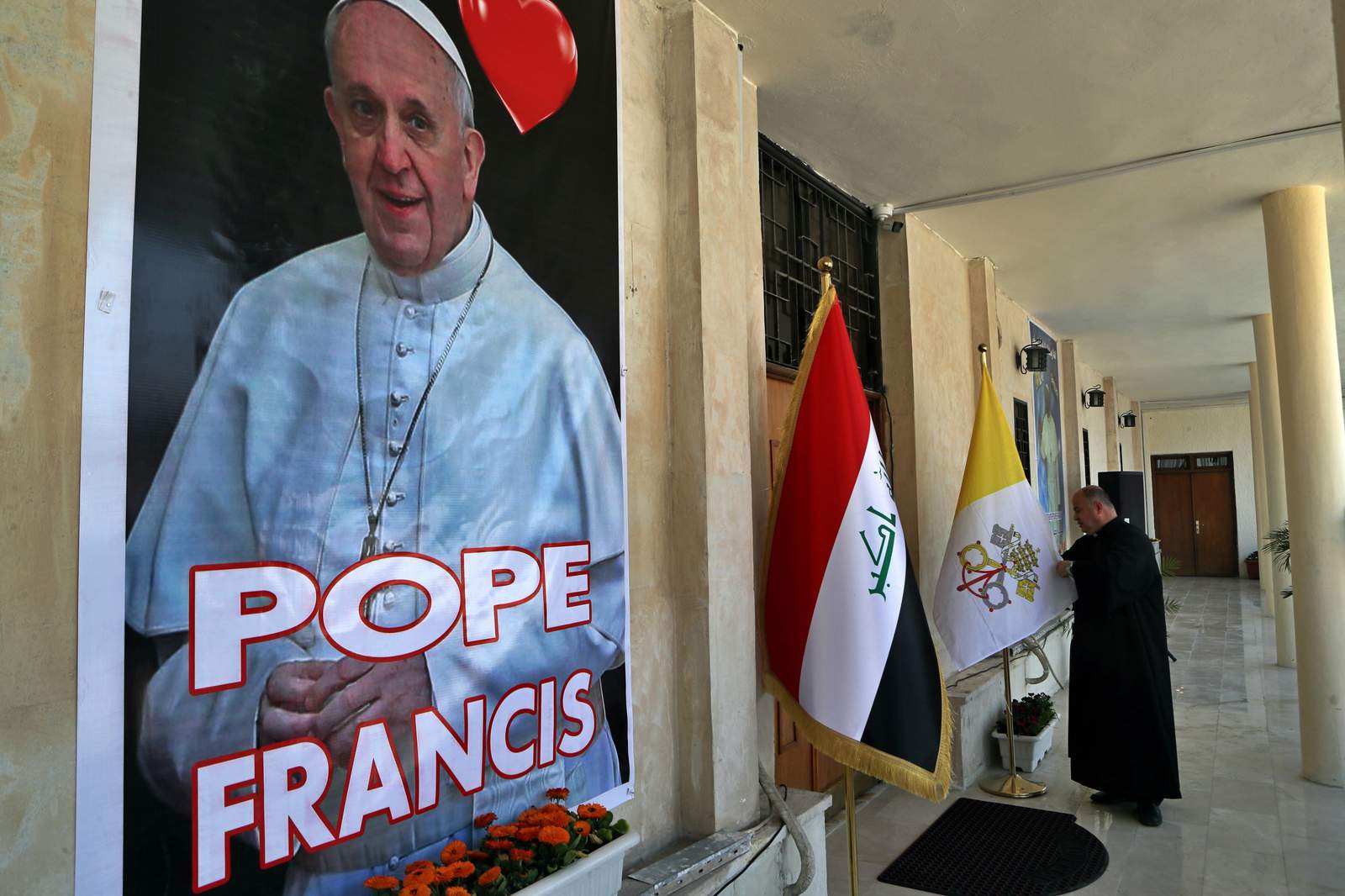 Vatican defends pope's Iraq trip amid virus as 'act of love'