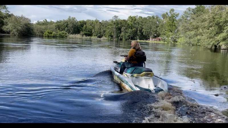 After Elsa’s downpours, Baker County woman now uses jet ski to get home