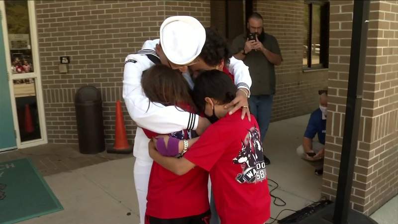 Sailor surprises her 3 children at Neptune Beach Elementary after 10 months apart