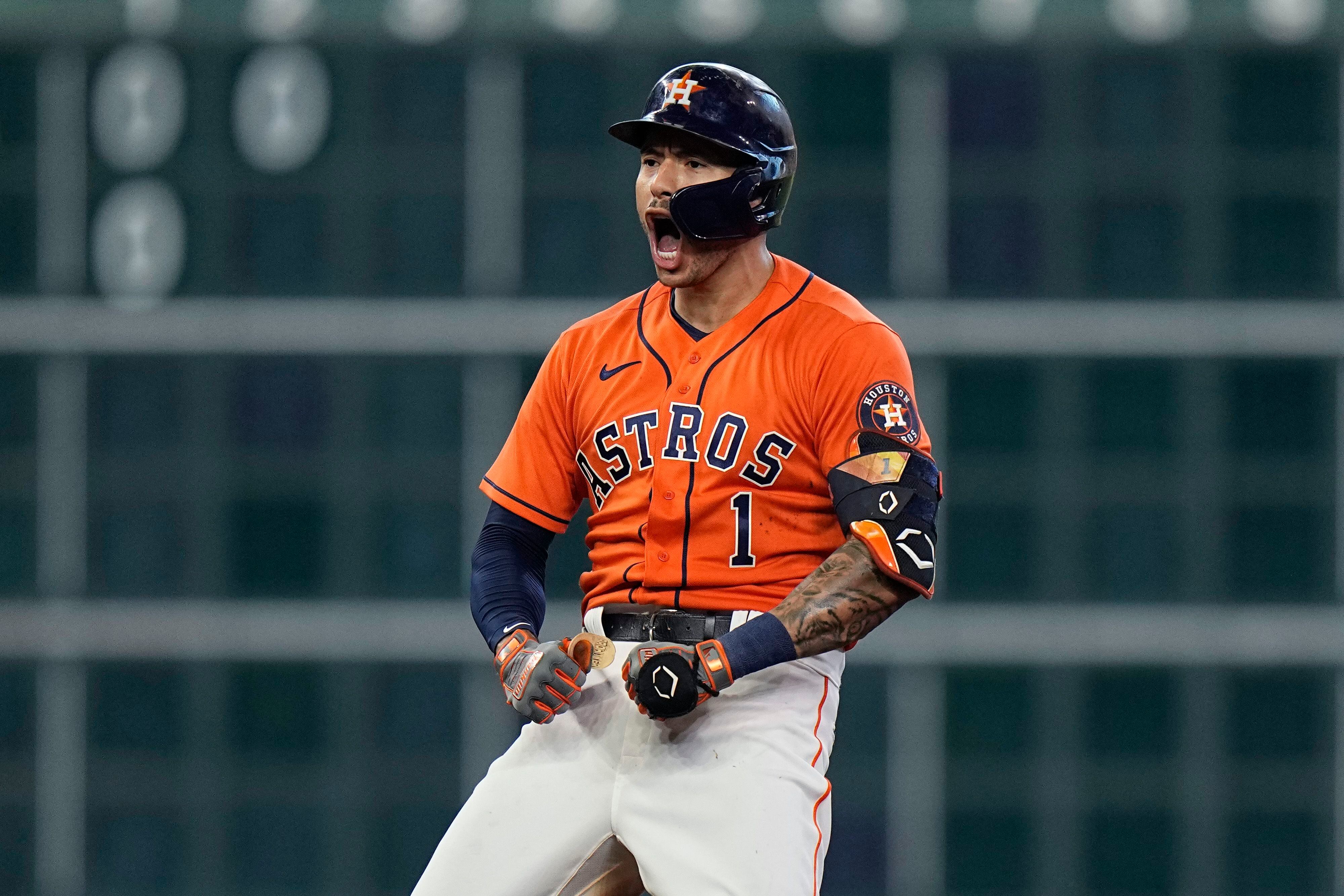 Houston, USA. 15th Oct, 2021. Houston Astros first baseman Yuli Gurriel  gestures after hitting a single in the 2nd inning in game one of the MLB  ALCS against the Boston Red Sox
