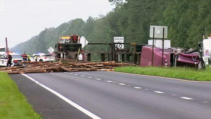 Overturned log truck blocks US 301 northbound before Interstate 10