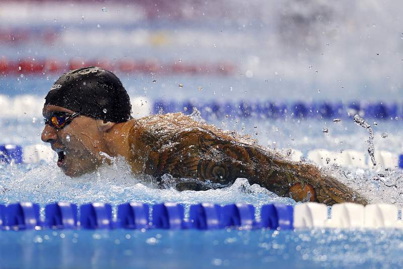 Caeleb Dressel wins 100 fly, earns another berth in Olympics