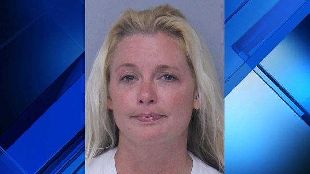 Woman accused of setting boyfriend's clothes on fire
