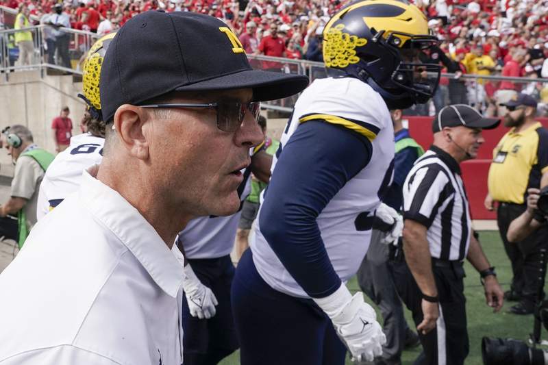 AP Top 25 Podcast: Harbaugh's stock up; Orgeron's stock down