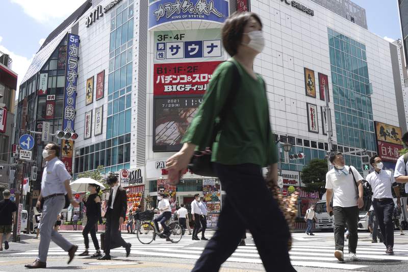 Officials in Tokyo alarmed as cases hit record highs