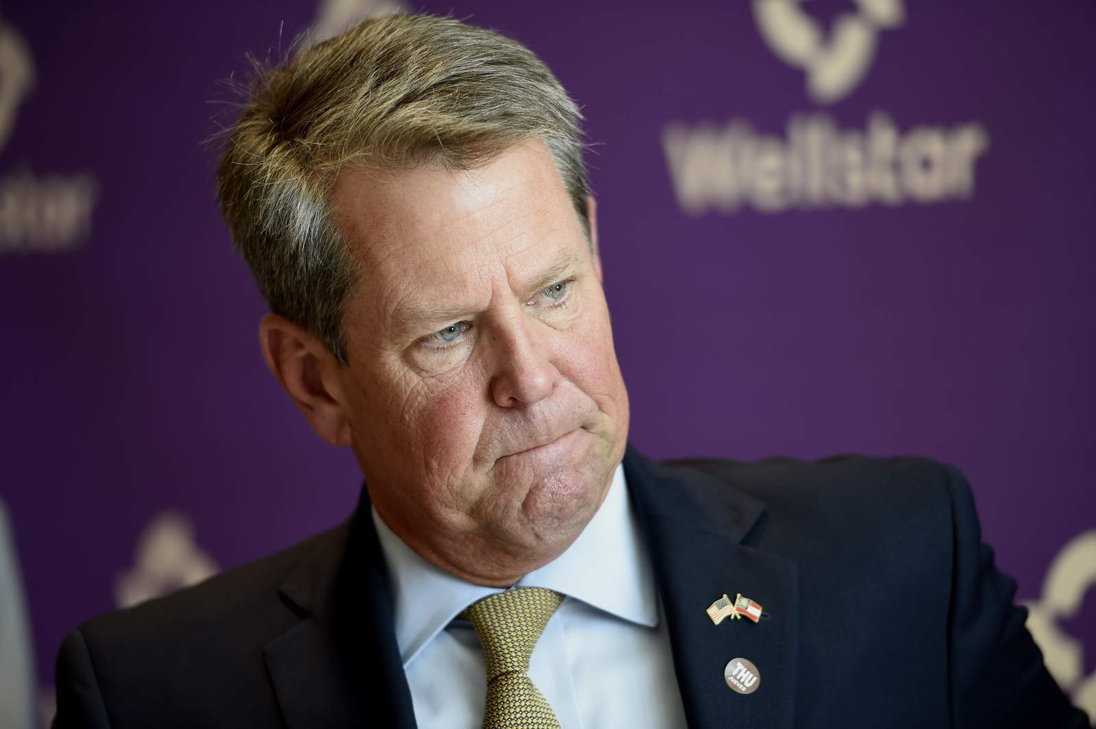 Georgia Gov. Kemp sues to end cities defiance on mask rules