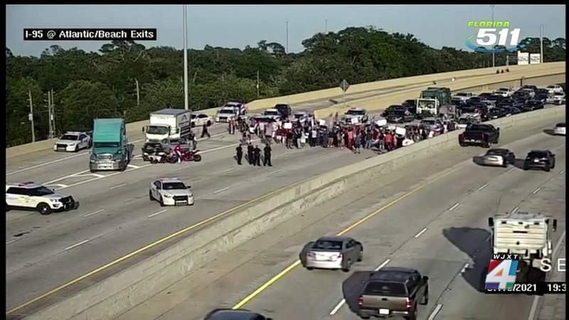 Demonstrators calling for change in Cuba shut down traffic on I-95