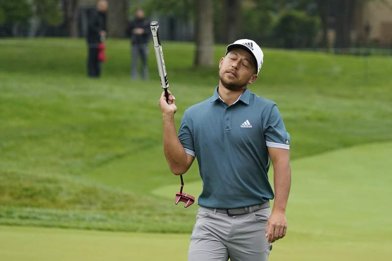 Morikawa leads at Muirfield Village on day suspended by rain
