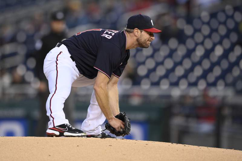 Nats' Scherzer exits after 12 pitches with apparent injury