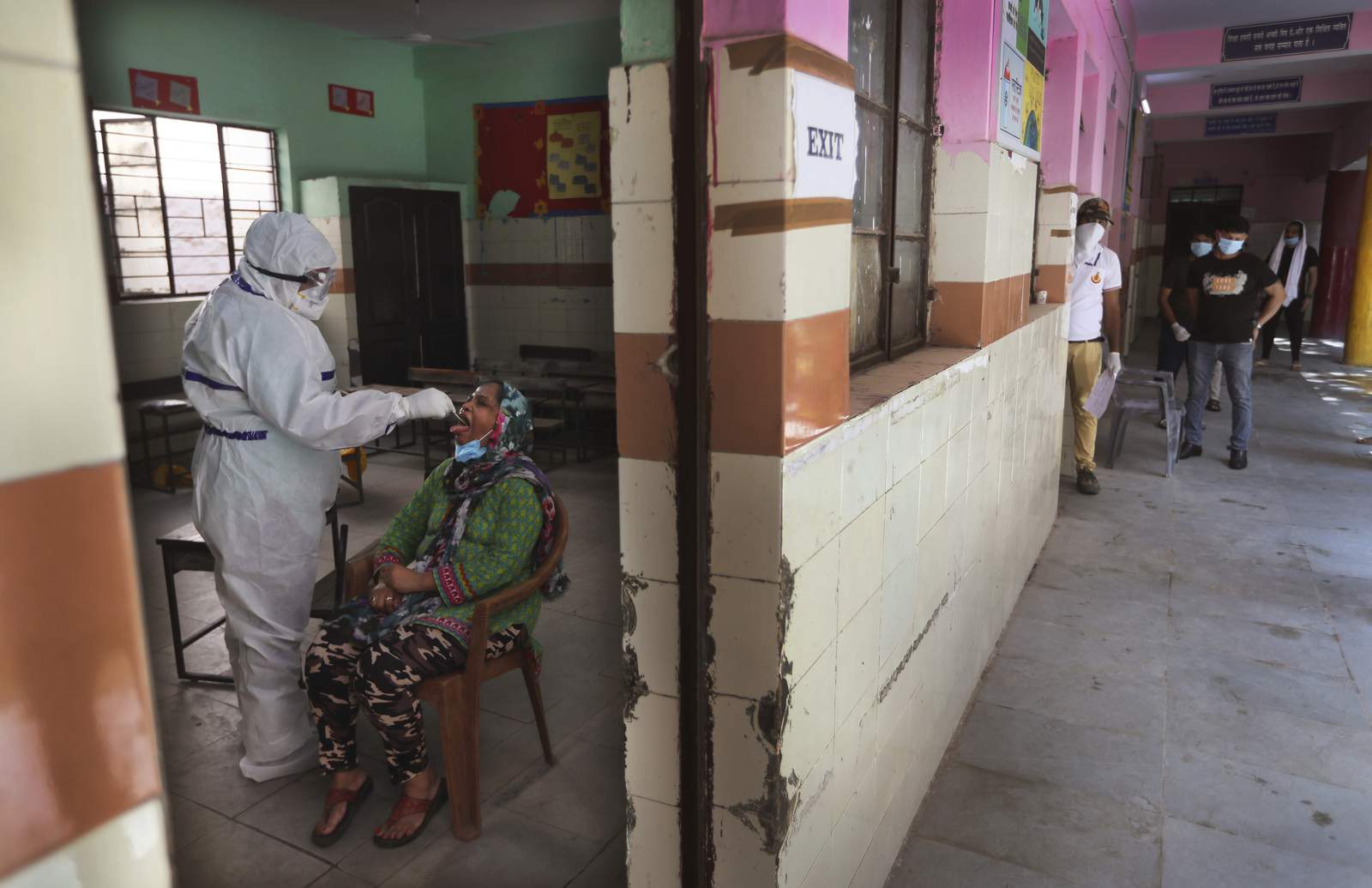 The Latest: New Delhi's rising cases prompt mass test effort