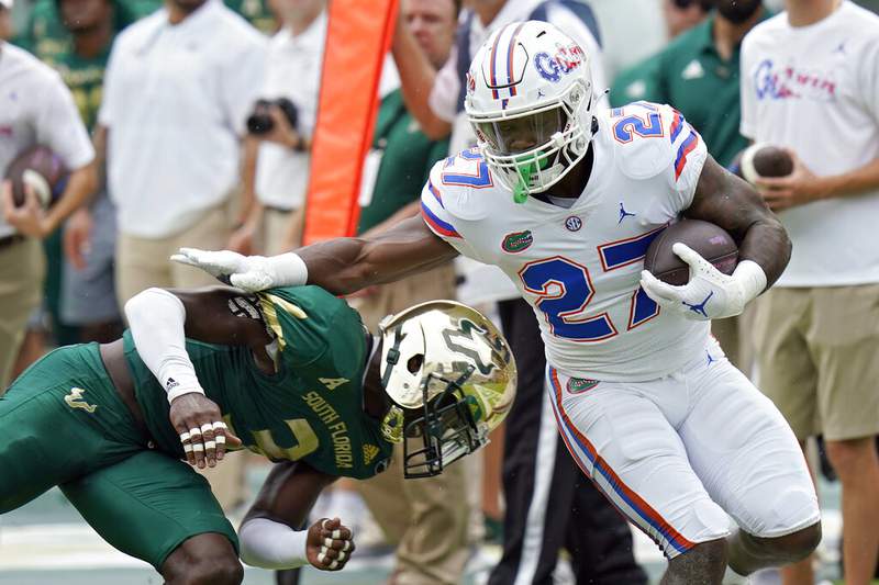 No. 11 Florida welcomes favored, top-ranked Alabama to Swamp