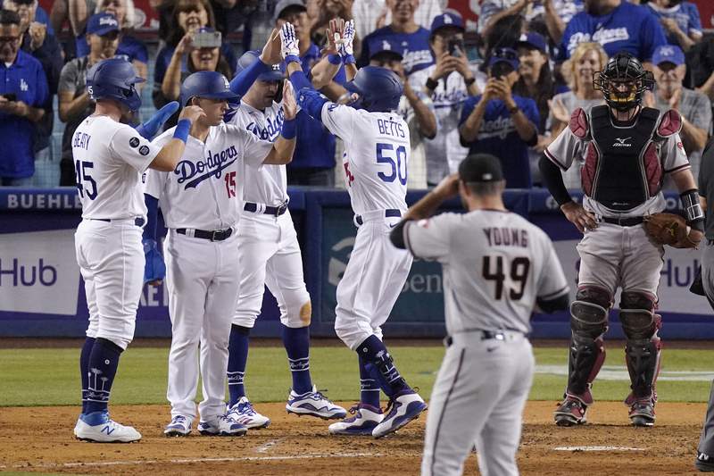 Dodgers tie franchise record with 8 HRs, blast D-Backs 22-1