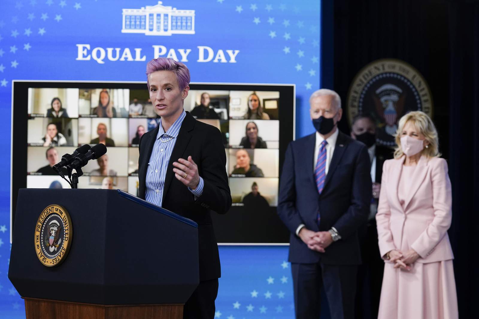 Women's soccer stars join Biden to promote closing pay gap