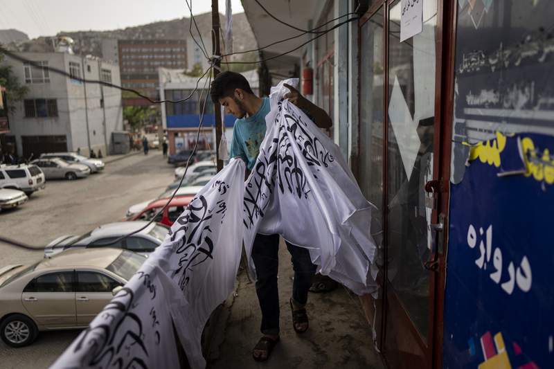 Kabul flag shop running since Soviet era retools yet again