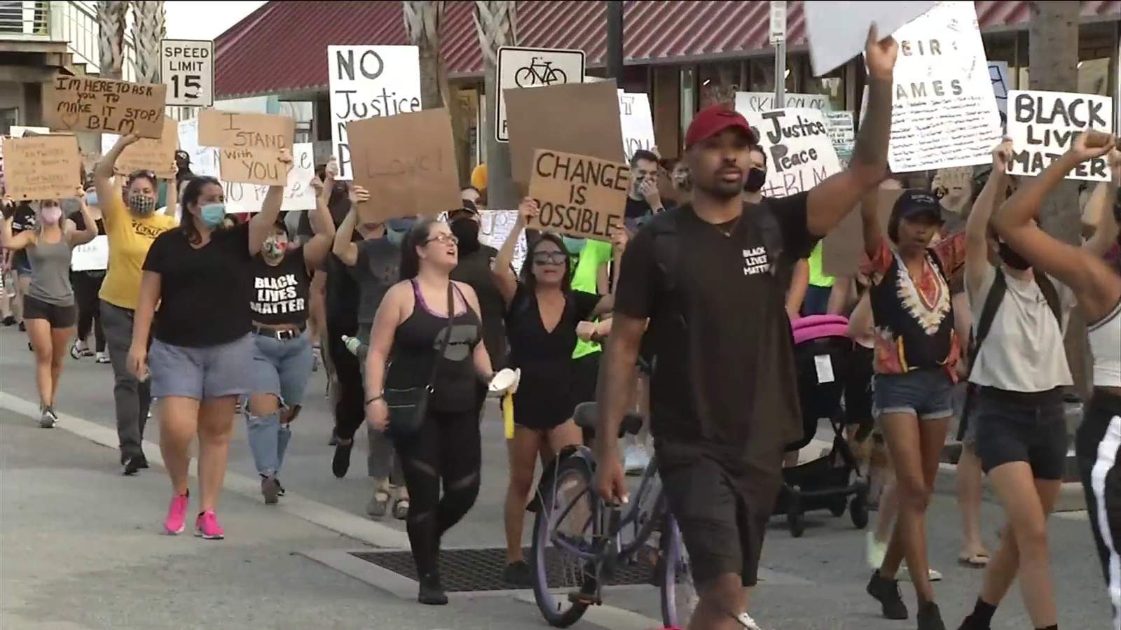 Peaceful protesters march through streets of Jacksonville Beach
