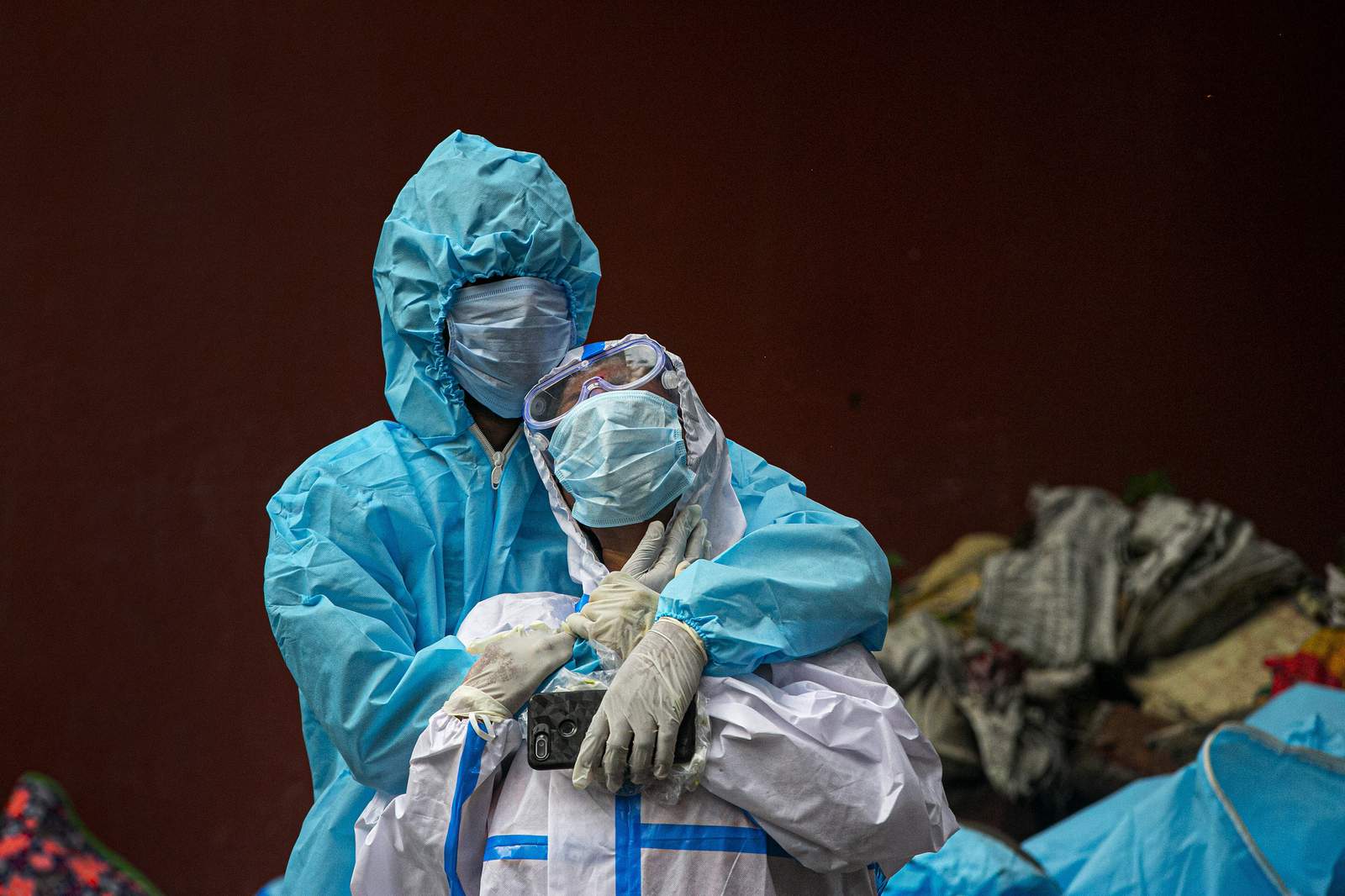 The Latest: UN chief says pandemic toll is 'mind-numbing'