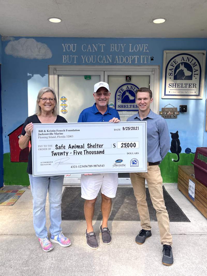 Jacksonville Marine presents Safe Animal Shelter of Clay County with $25,000 donation