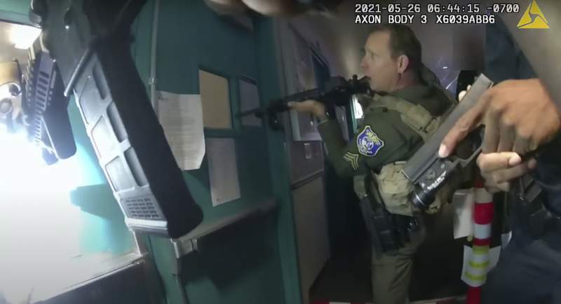 Police release dramatic body-cam video of rail yard shooting