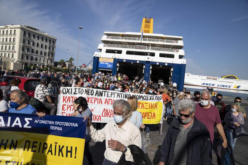Striking seamen in Greece temporarily disrupt ferry services