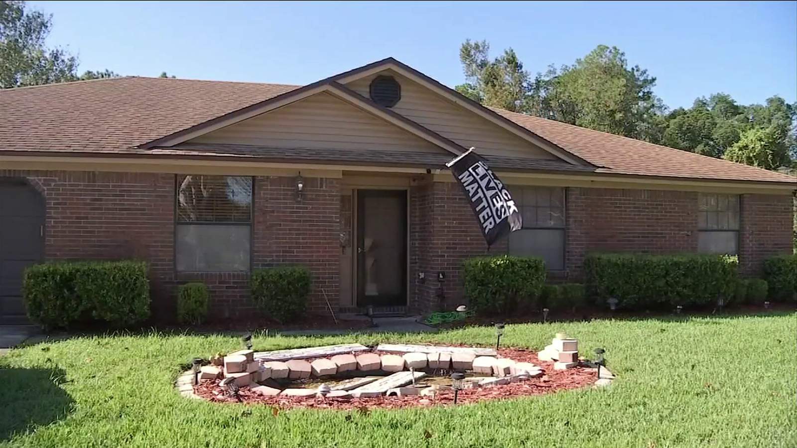 Homeowner sues over HOA’s order to remove BLM flag