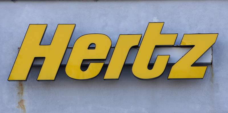 In this Tuesday, Nov. 28, 2017 photograph  a Hertz rental car   logo rests connected  the beforehand   of a Hertz location, successful  Boston. Car rental institution  Hertz is ordering 100,000 electrical  vehicles from Tesla. The institution  says its buying the Tesla Model 3s by the extremity  of 2022, and it besides  volition  bargain  electrical  conveyance  chargers. No terms  was fixed  for the order, but it has to beryllium  worthy  astir   $4 cardinal  due to the fact that each   Model 3 has a basal  terms  of astir   $40,000. (AP Photo/Steven Senne, file)