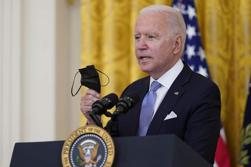 Biden lands win, but virus surge threatens to derail agenda