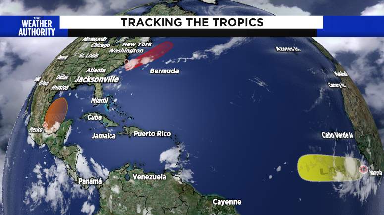 Hurricane forecasters watching a developing depression and 2 disturbances in tropics