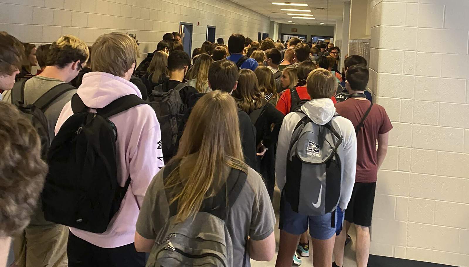 Georgia school with large crowds reports positive cases