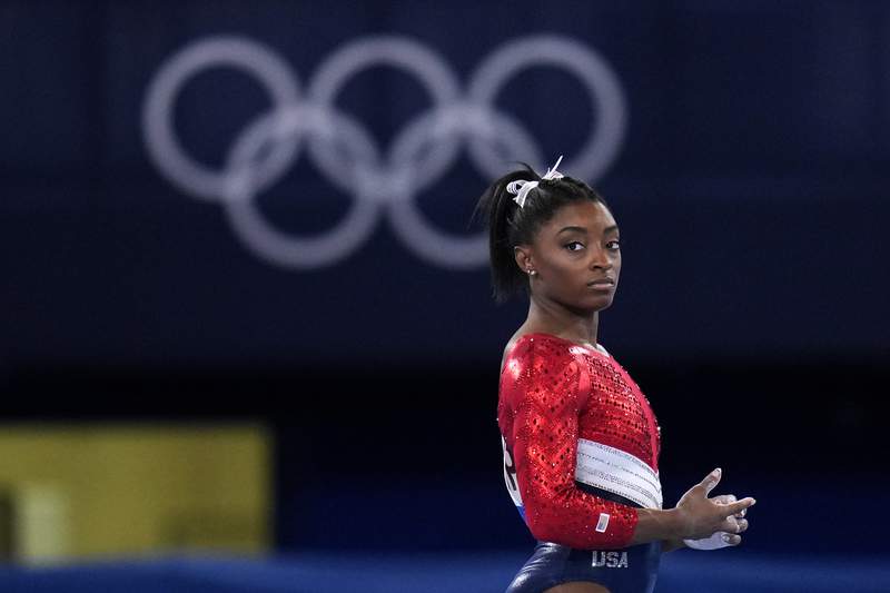 Olympic champ Biles withdraws from all-around competition
