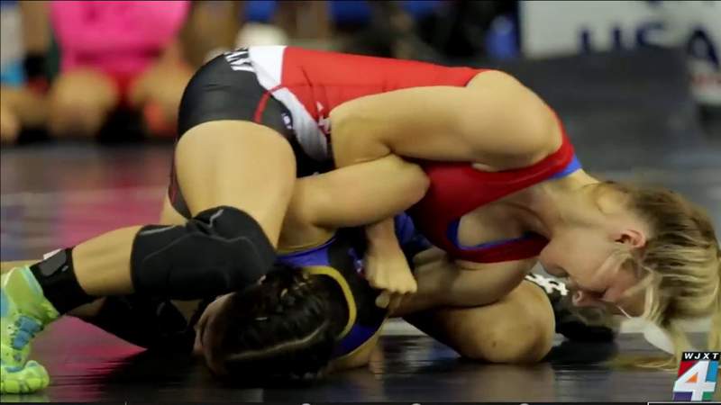 Champion wrestler fighting to give more girls in Florida chance to hit mat