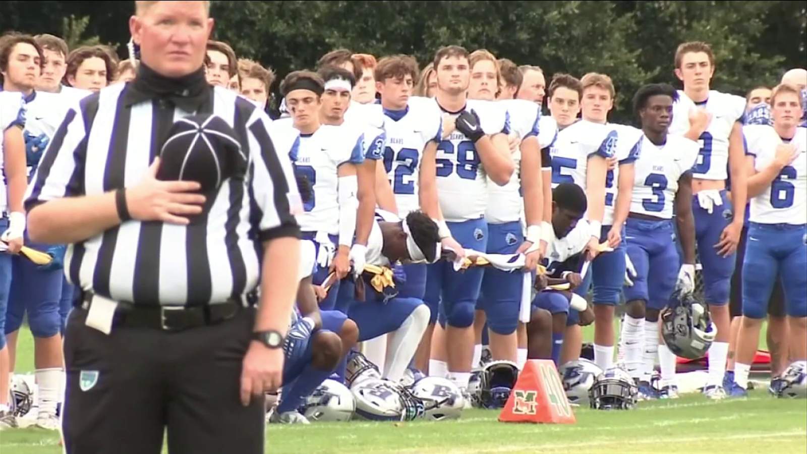 Move by some Bartram Trail football players to kneel during national anthem stirs debate
