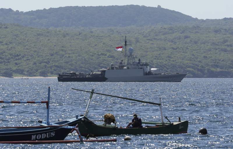 Indonesia looking for submarine that may be too deep to help