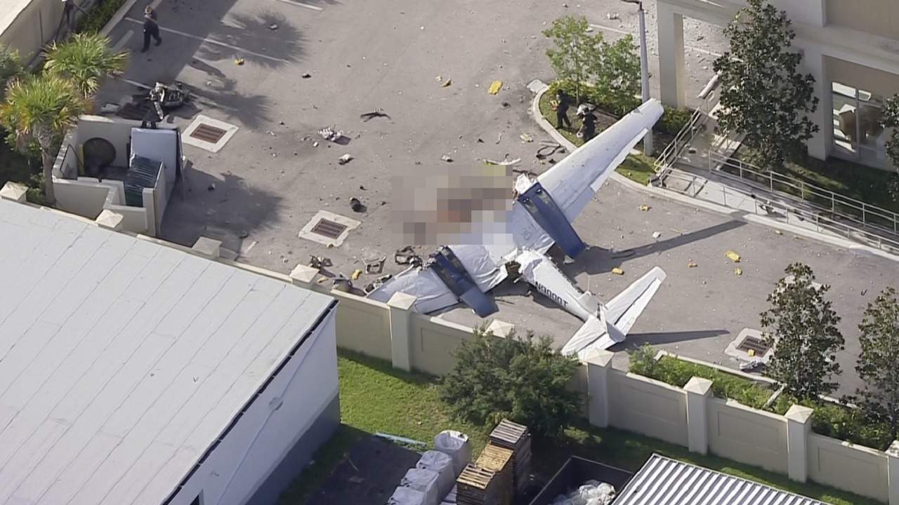 2 killed when plane crashes into public storage building