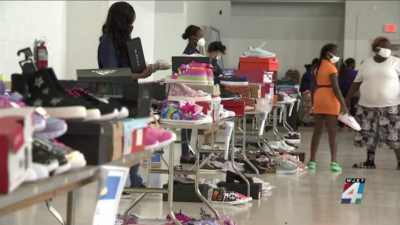 You did this! Children get new shoes from Kicks for Kids