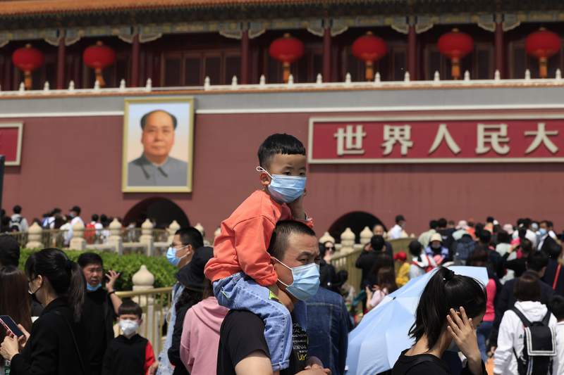 China adds few babies, loses workers as its 1.4B people age