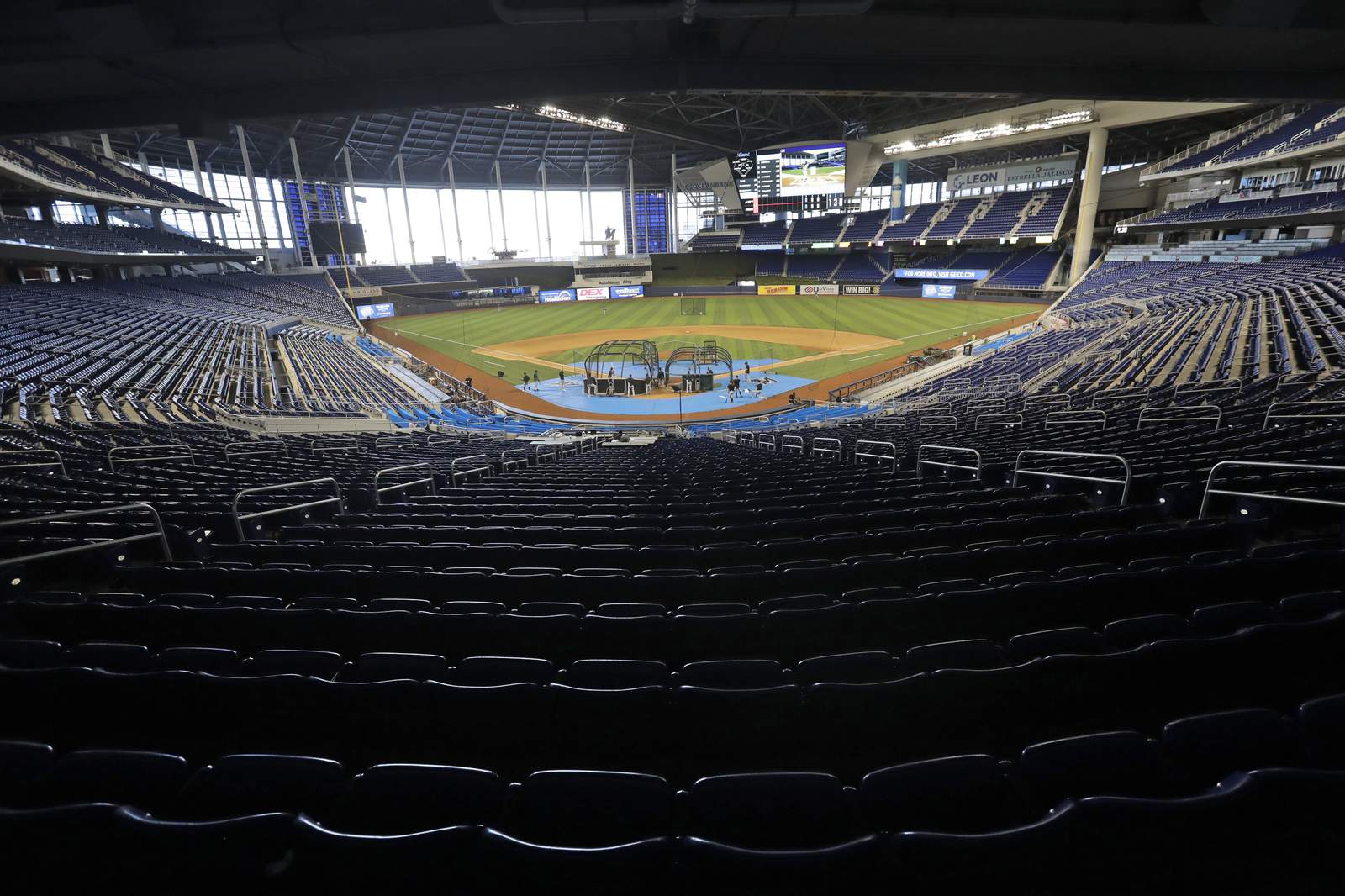 Marlins end isolation in Philly and leave for Baltimore