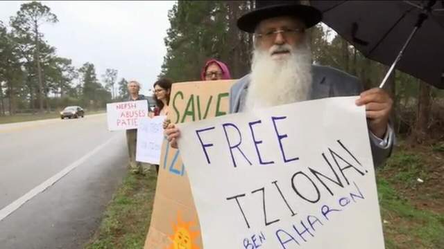 Family protests woman's treatment at mental facility