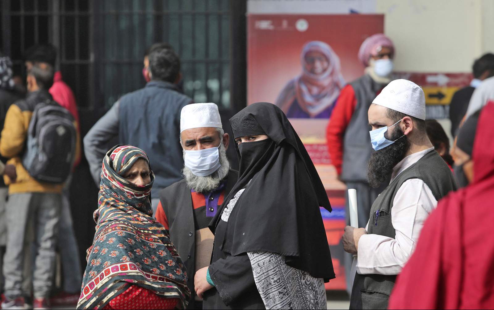 The Latest: India finds new cases of a coronavirus variant
