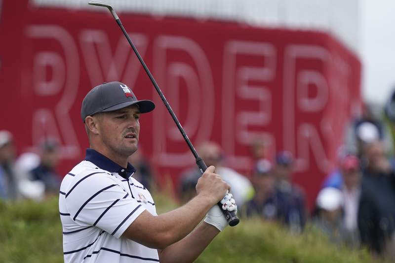 The Latest: DeChambeau makes a promise to 'Cheeseheads'