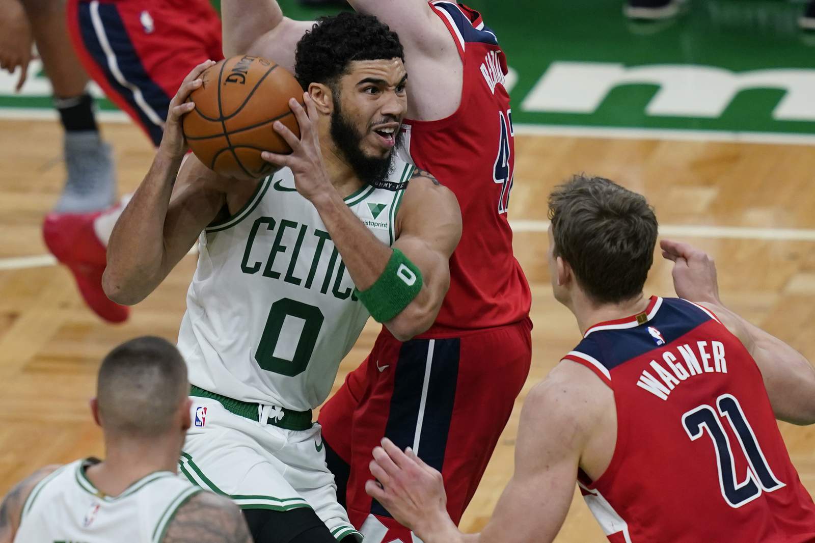 The Latest: Celtics list 7 players unavailable vs Heat