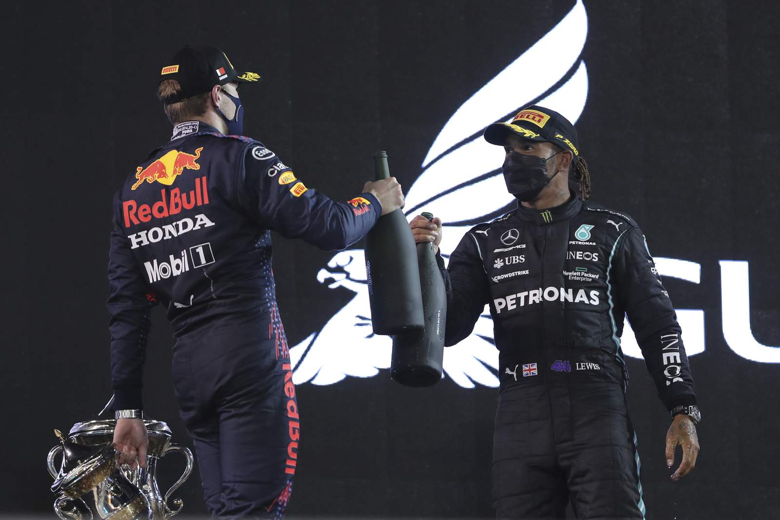 Hamilton holds off Verstappen to win tense F1 season-opener