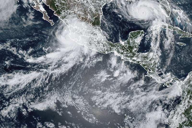 Tropical Storm Nora hugs Mexico's coast; 1 dead, 7 missing