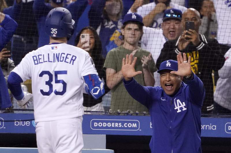 Dodgers hit 4 HRs in 8th to rally past Padres 11-9