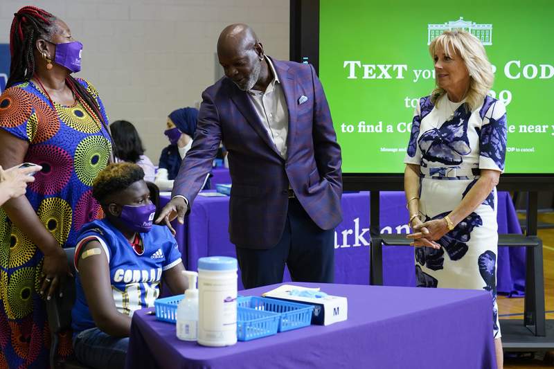 Jill Biden teams up with NFL great to push vaccinations