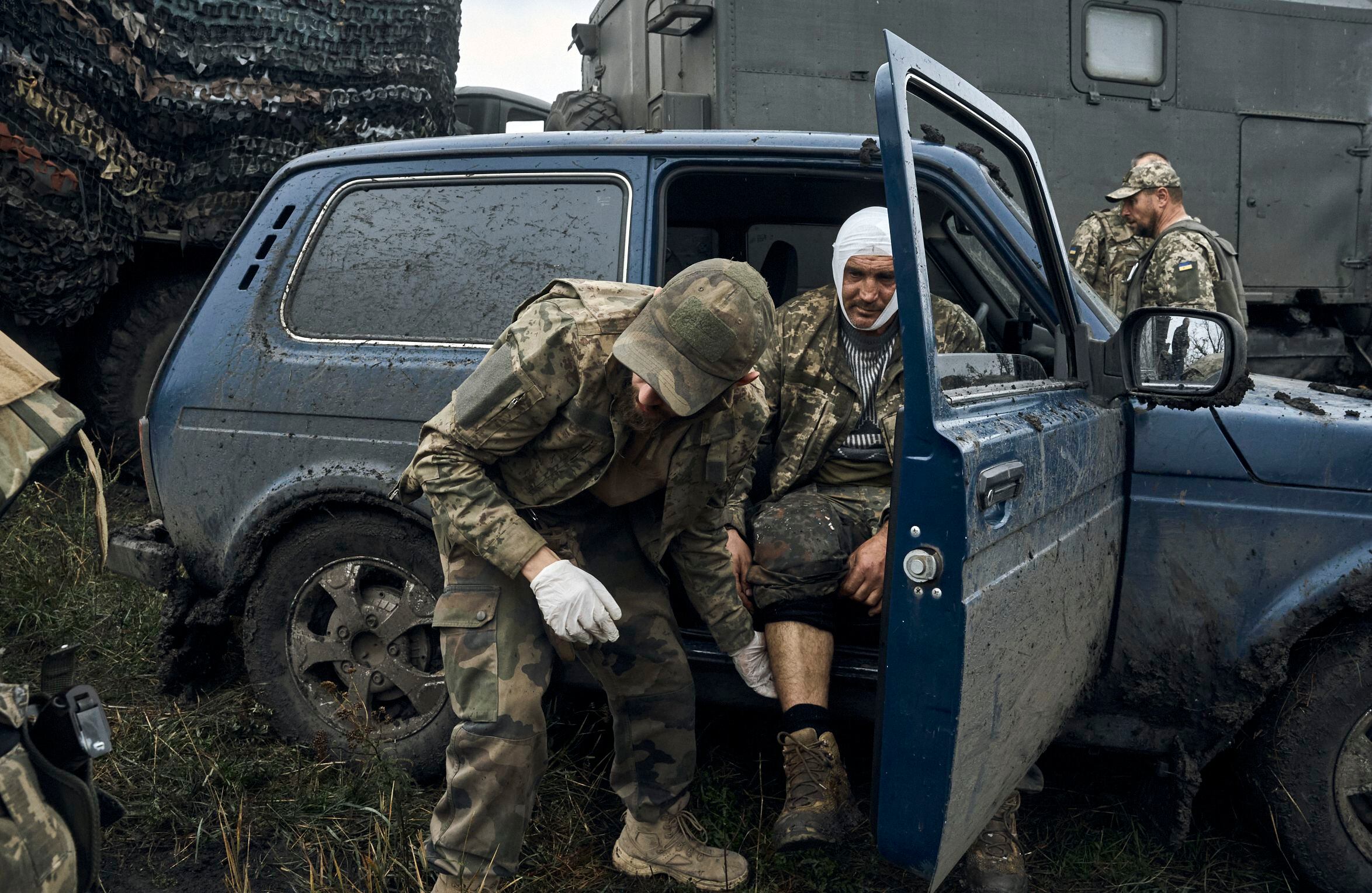 Ukrainian soldiers burn Russian flag in Vovchansk as they regain territory  